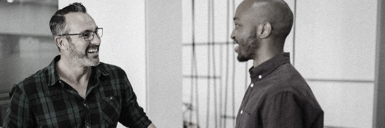 Two men having a pleasant conversation